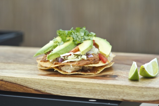 Adding the cilantro to the chalupa