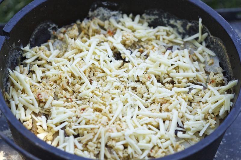 Cheese added to scalloped Idaho potatoes | Cooking-Outdoors.com | Gary House