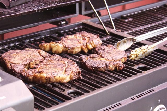 Chili, Cocoa and Espresso Rubbed Steak on the grill | Traveling4Food | Gary House