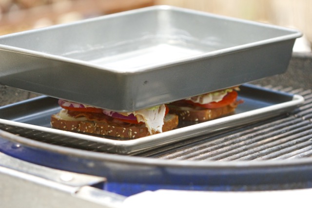 Grilled Turkey Melt Sandwich between two trays | Cooking-Outdoors.com | Gary House