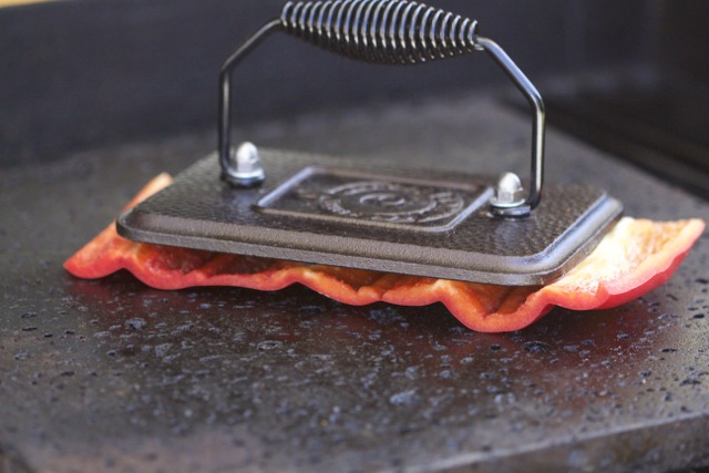 Grilling Red Bell Pepper under Bacon Press | Cooking-Outdoors.com | Gary House