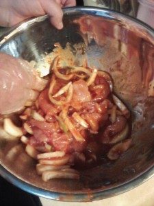 Mixing the Korean pork BBQ by hand