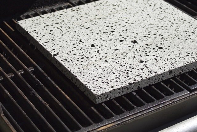 Island Grillstone on the grill to coat with oil | Cooking-Outdoors.com | Gary House