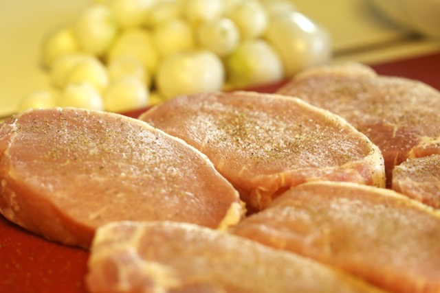 Salt and pepper the boneless pork chops