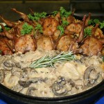 Stuffed Quail with Venison Raviloli and Wild Mushroom sauce